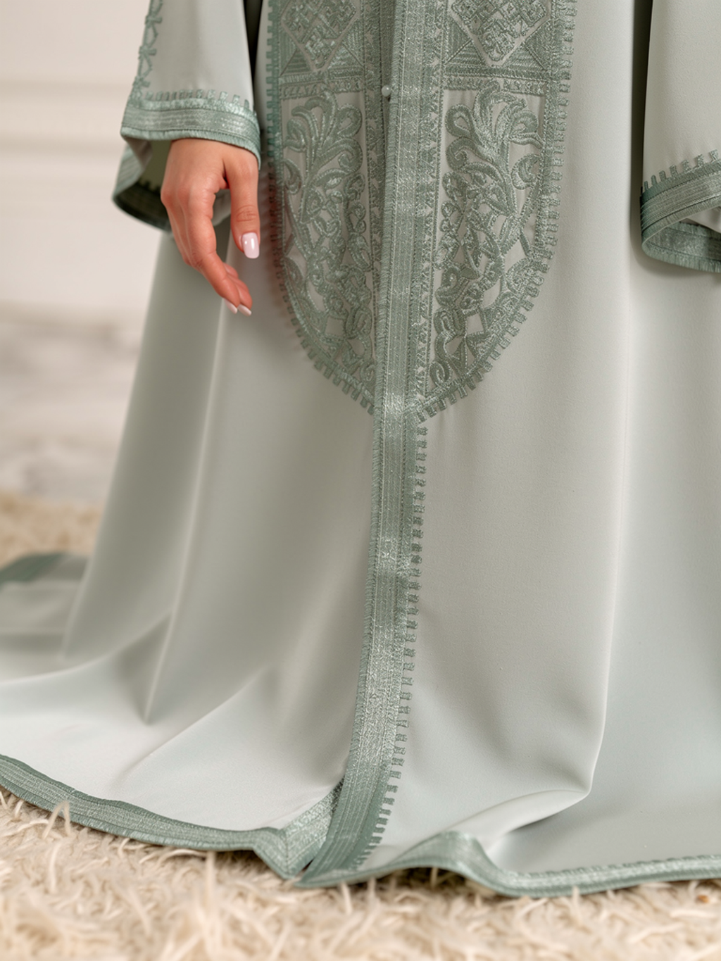 Takchita Maya Vert Menthe — détail manche et ourlet